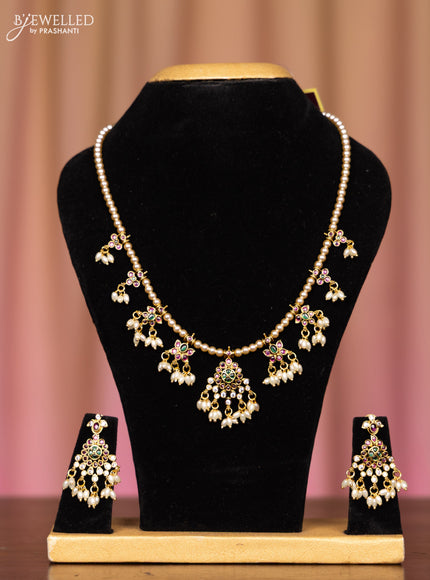 Pearl necklace with kemp and cz stones in pearl hangings