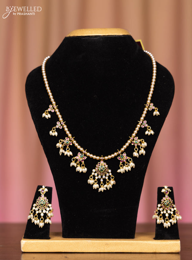 Pearl necklace with kemp and cz stones in pearl hangings