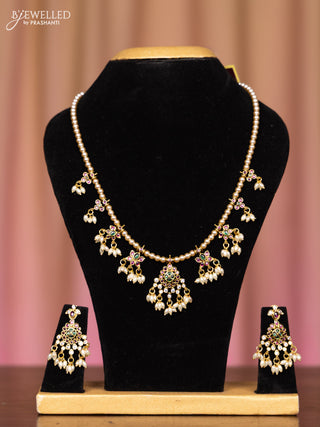 Pearl necklace with kemp and cz stones in pearl hangings