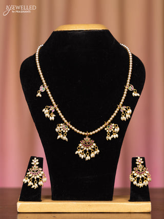 Pearl necklace with kemp and cz stones in pearl hangings