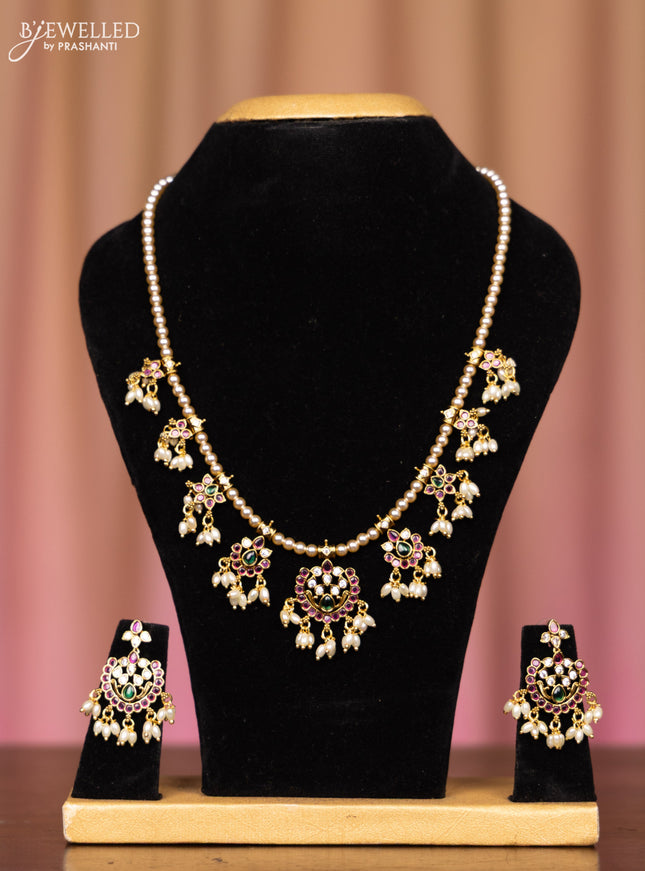 Pearl necklace with kemp and cz stones in pearl hangings