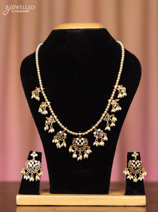 Pearl necklace with kemp and cz stones in pearl hangings