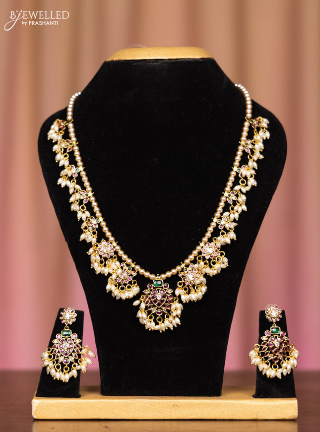 Pearl necklace with kemp and cz stones in pearl hangings