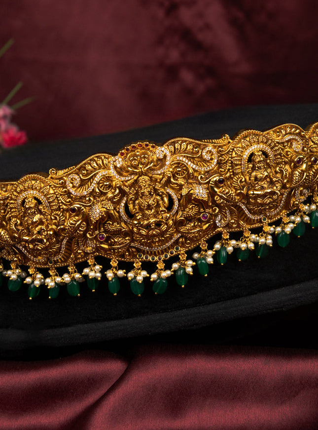 Antique self emboss hip belt lakshmi pendant with kemp & cz stones and pearl &beads hangings