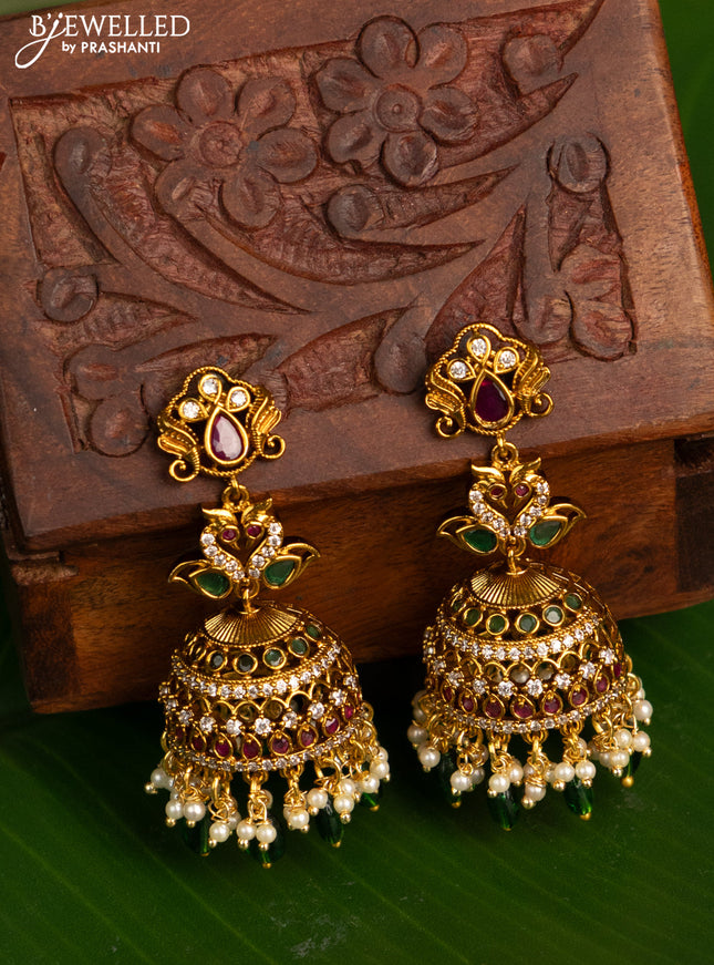 Antique jhumka swan design with kemp & cz stones and pearl & green beads hanging