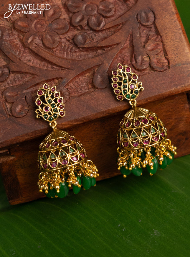 Antique jhumka with kemp stones and golden & green beads hanging