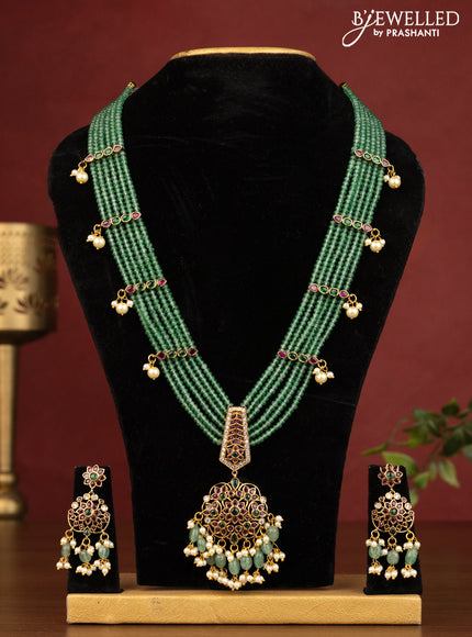 Beaded multilayer green haaram with kemp stones and beads & pearl hangings