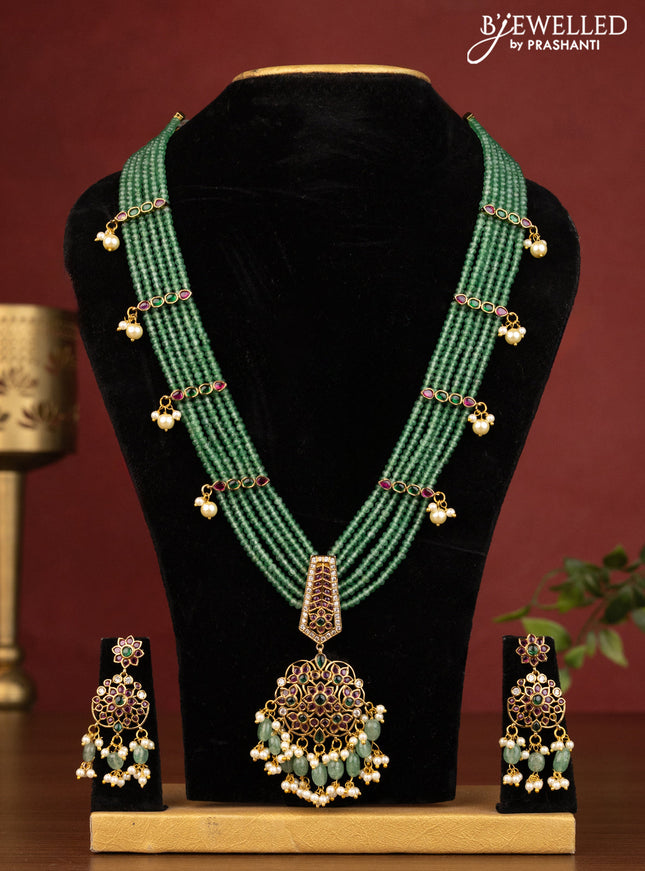 Beaded multilayer green haaram with kemp stones and beads & pearl hangings