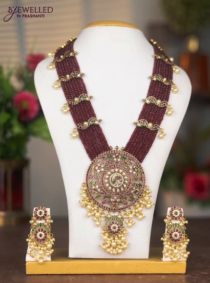 Beaded multilayer maroon haaram with kemp stones and pearl hangings