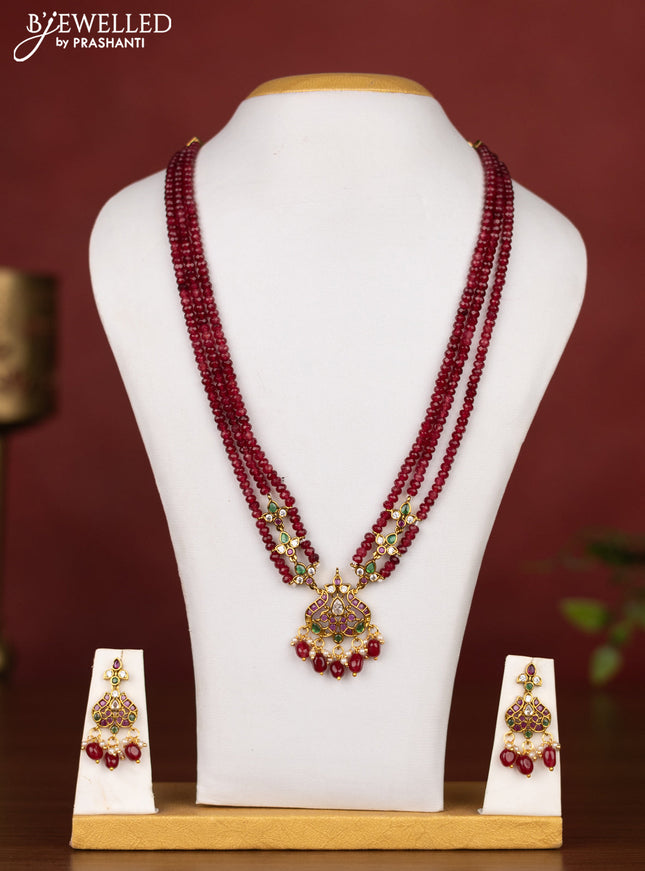 Beaded multilayer maroon necklace with kemp,cz stones and pearl hangings