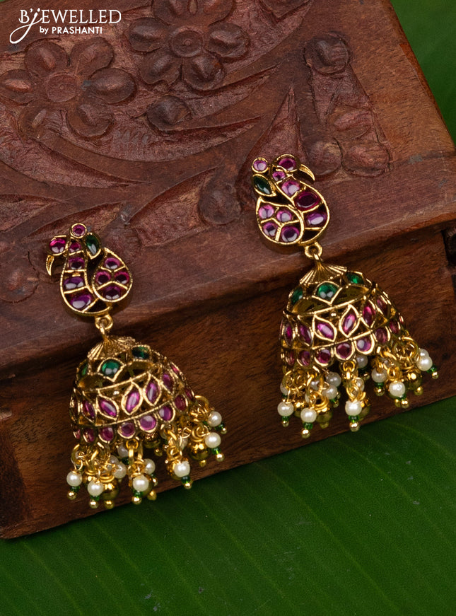 Antique medium size peacock design jhumka with kemp and pearl hangings