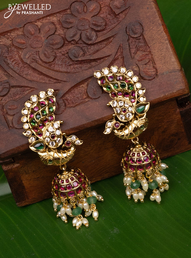 Antique medium size peacock design jhumka with kemp and pearl hangings