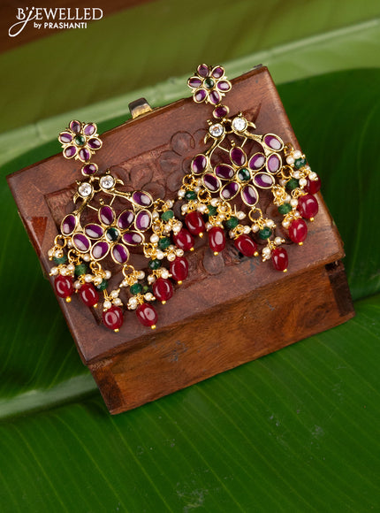 Antique earing peacock design with kemp & cz stones and pearl hangings