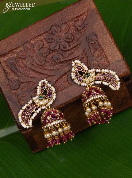 Antique jhumka peacock design with kemp and pearl hangings