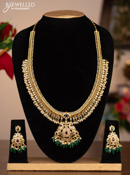 Antique haram double peacock design with cz stones and pearl beads hanging