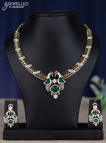 zircon necklace peacock design with emerald and cz stones in gold finish