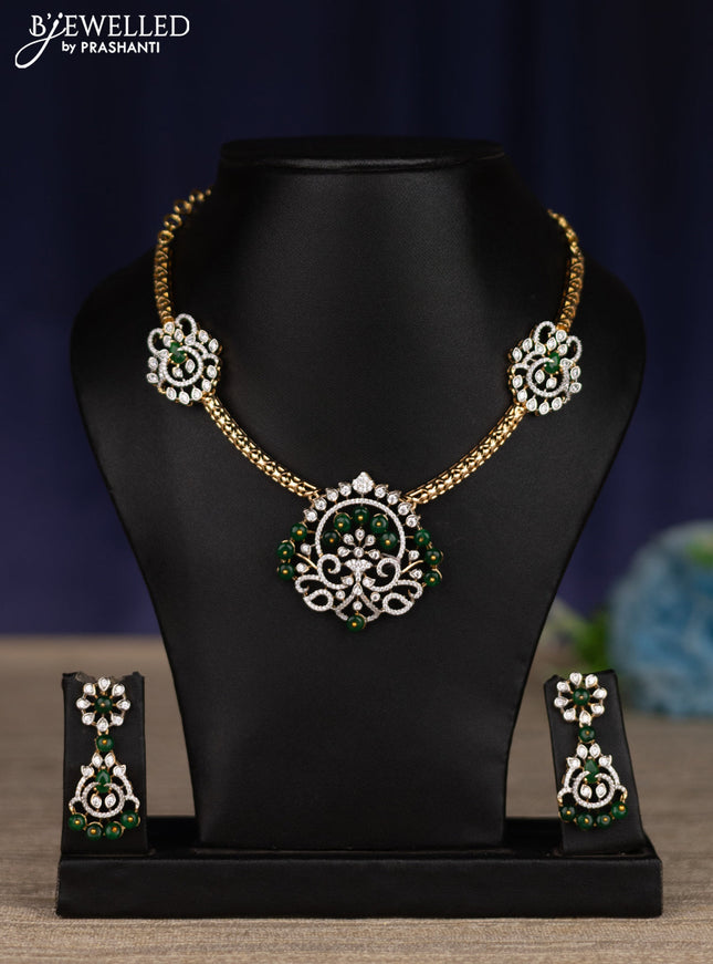 zircon necklace with emerald and cz stones in gold finish