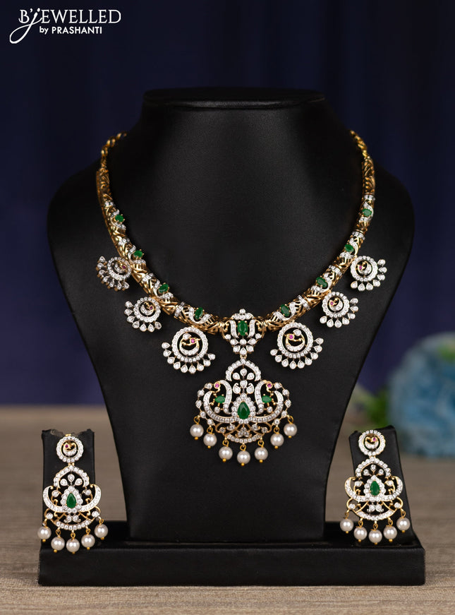 zircon necklace with emerald & cz stones and pearl hangings in gold finish