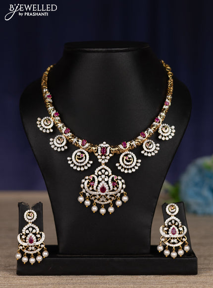 zircon necklace with ruby & cz stones and pearl hangings in gold finish