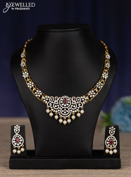 zircon necklace with ruby & cz stones and pearl hangings in gold finish