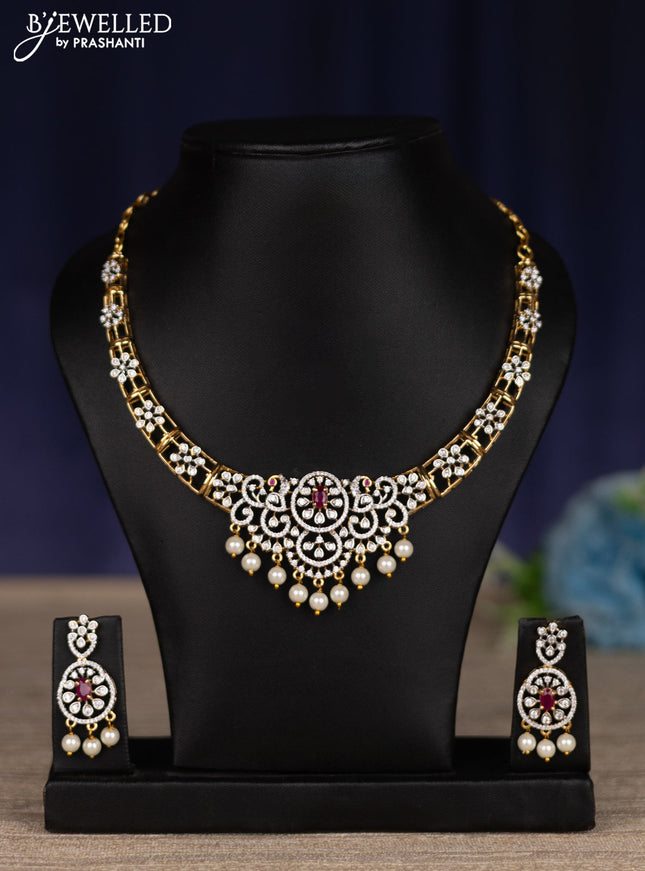 zircon necklace with ruby & cz stones and pearl hangings in gold finish