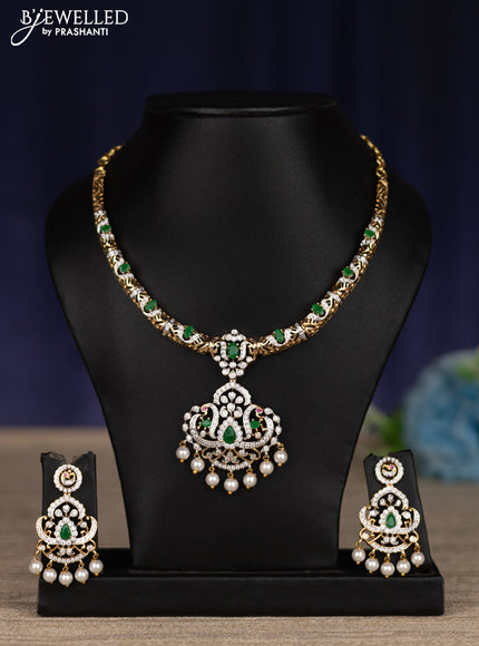 zircon necklace with emerald & cz stones and pearl hangings in gold finish