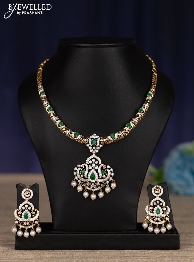 zircon necklace with emerald & cz stones and pearl hangings in gold finish