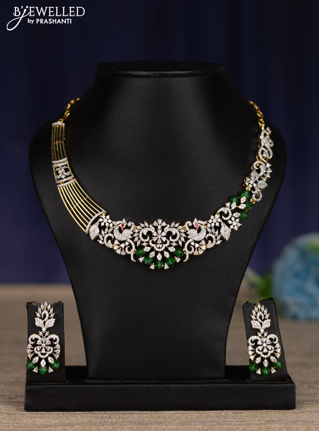zircon necklace with emerald and cz stones in gold finish