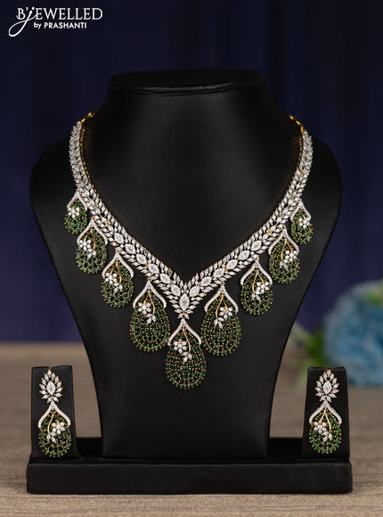 zircon necklace with emerald and cz stones in gold finish