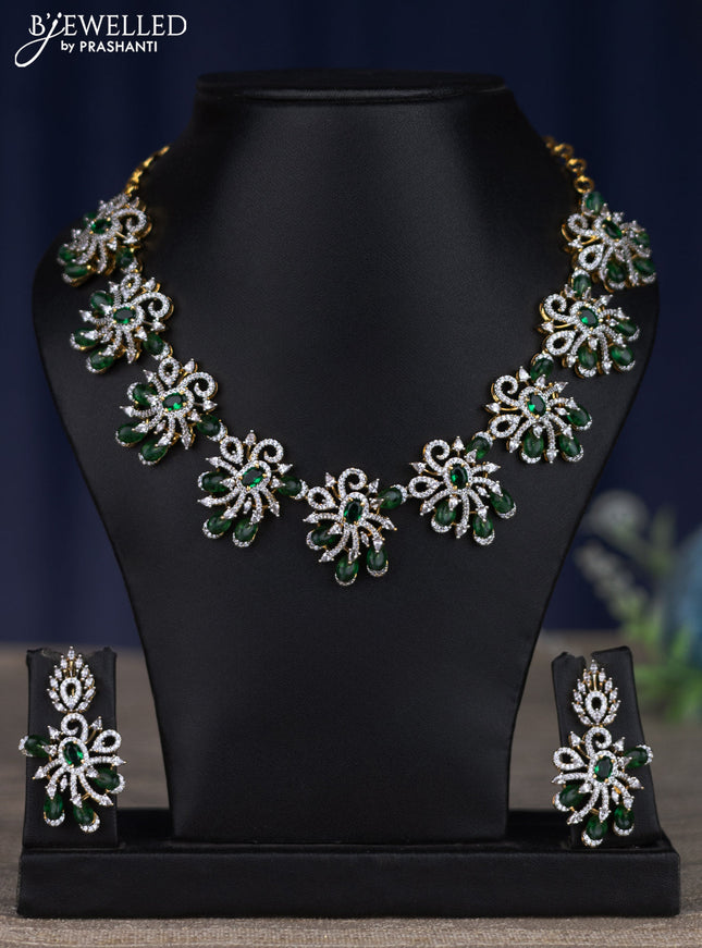 zircon necklace with emerald and cz stones in gold finish