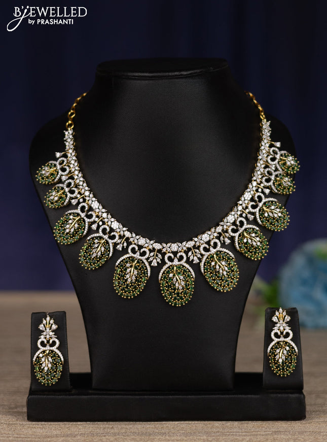 zircon necklace with emerald and cz stones in gold finish