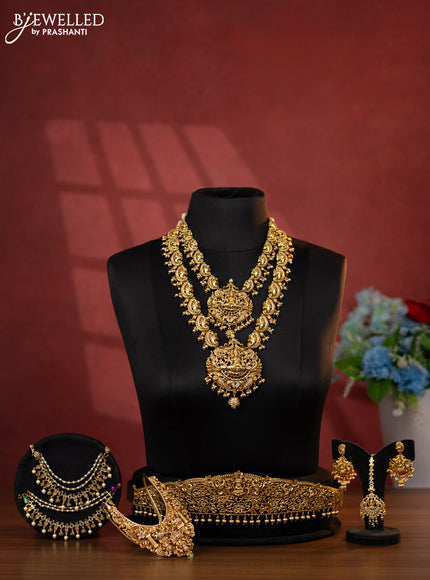 Antique bridal set lakshmi design with kemp cz stones and pearl & golden beads hanging