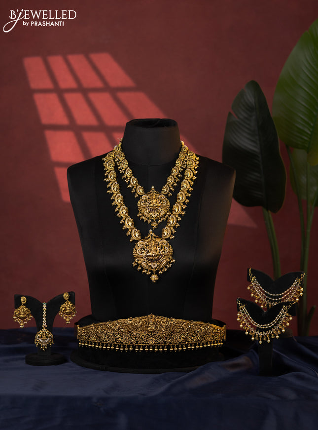Antique bridal set lakshmi design with kemp cz stones and pearl & golden beads hanging