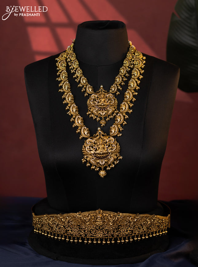 Antique bridal set lakshmi design with kemp cz stones and pearl & golden beads hanging