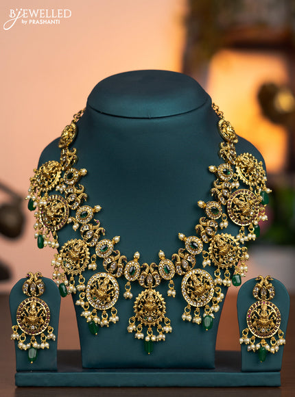 Antique necklace lakshmi design with kemp & cz stones and pearl & green beads hanging