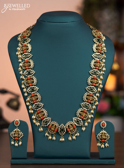 Antique haaram lakshmi design with pavalam green kemp & cz stones and pearl hangings