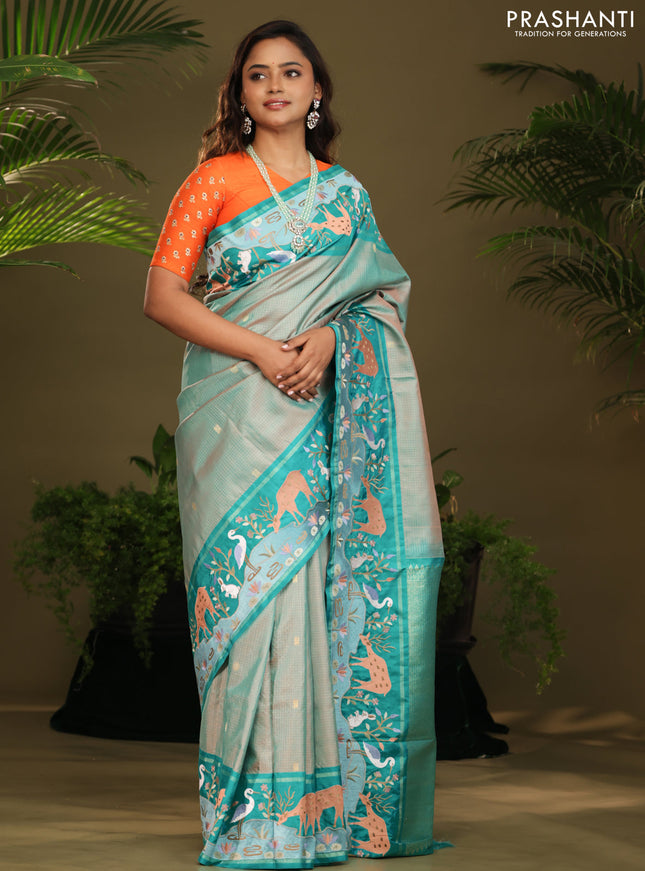 Dual shade of Teal Kanchipuram Silk saree with Border Embroidery