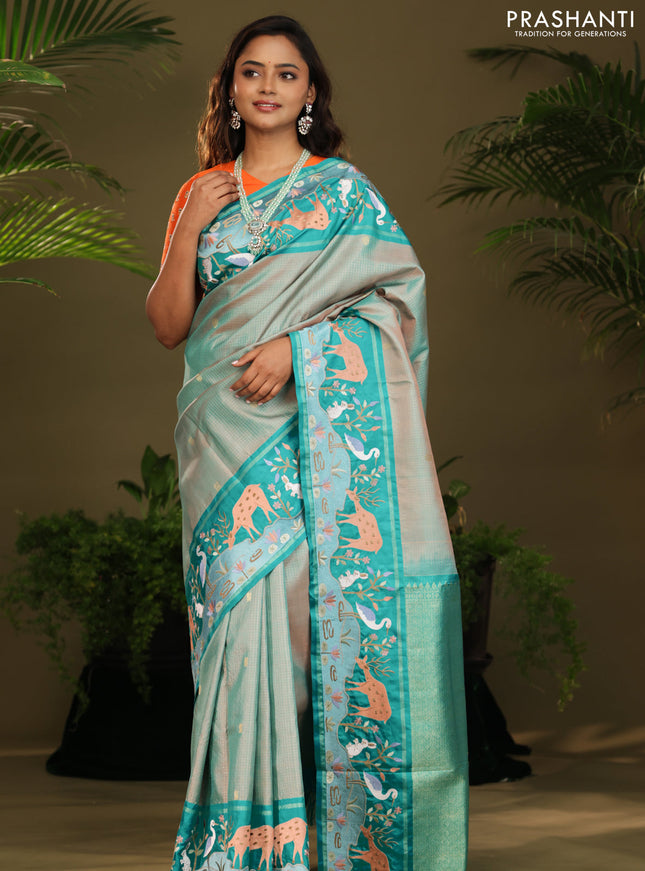 Dual shade of Teal Kanchipuram Silk saree with Border Embroidery