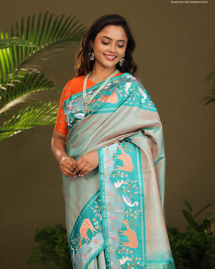 Dual shade of Teal Kanchipuram Silk saree with Border Embroidery