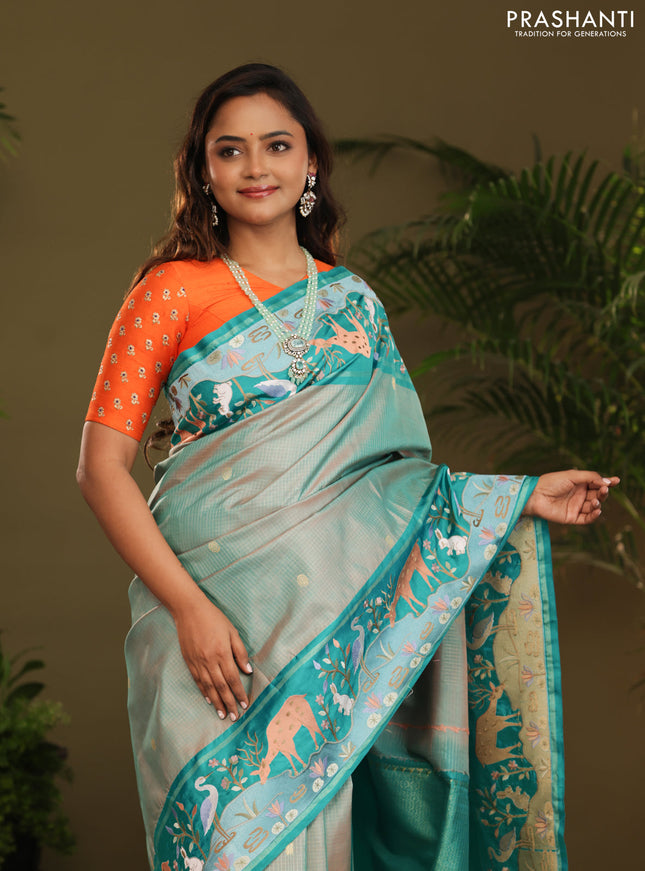 Dual shade of Teal Kanchipuram Silk saree with Border Embroidery