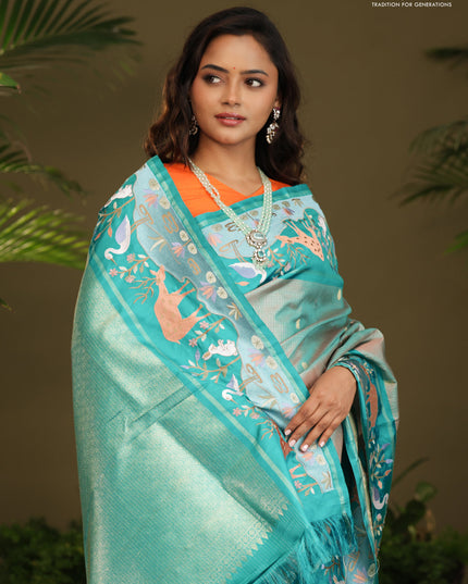 Dual shade of Teal Kanchipuram Silk saree with Border Embroidery