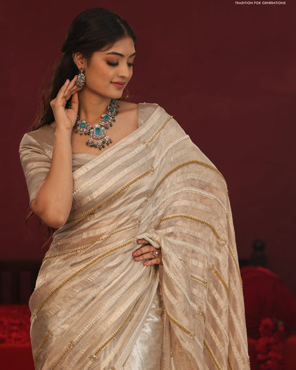 Tissue organza silk saree with allover stripes & embroidery