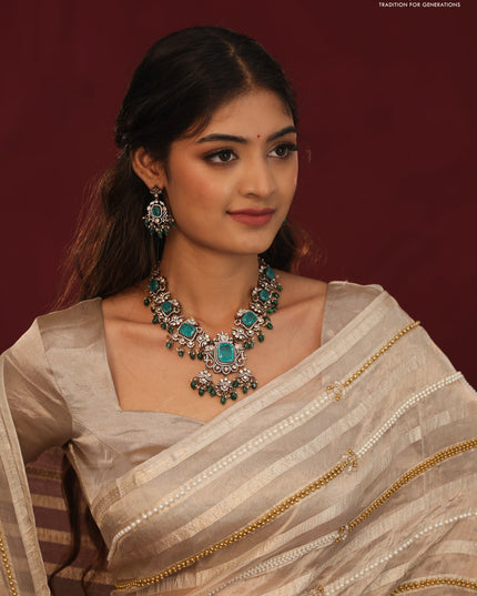 Tissue organza silk saree with allover stripes & embroidery