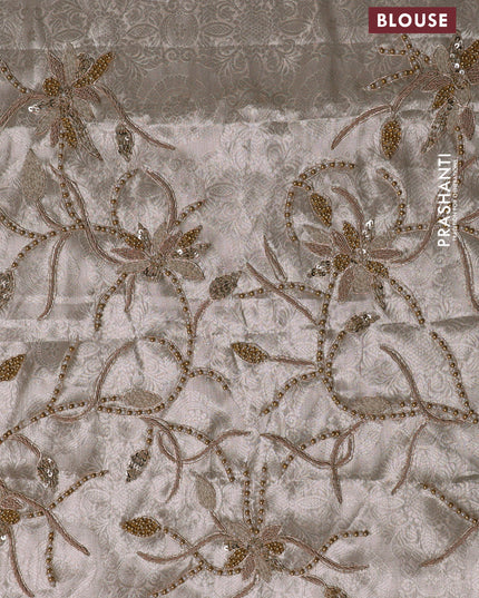 Tissue organza silk saree with allover stripes & embroidery