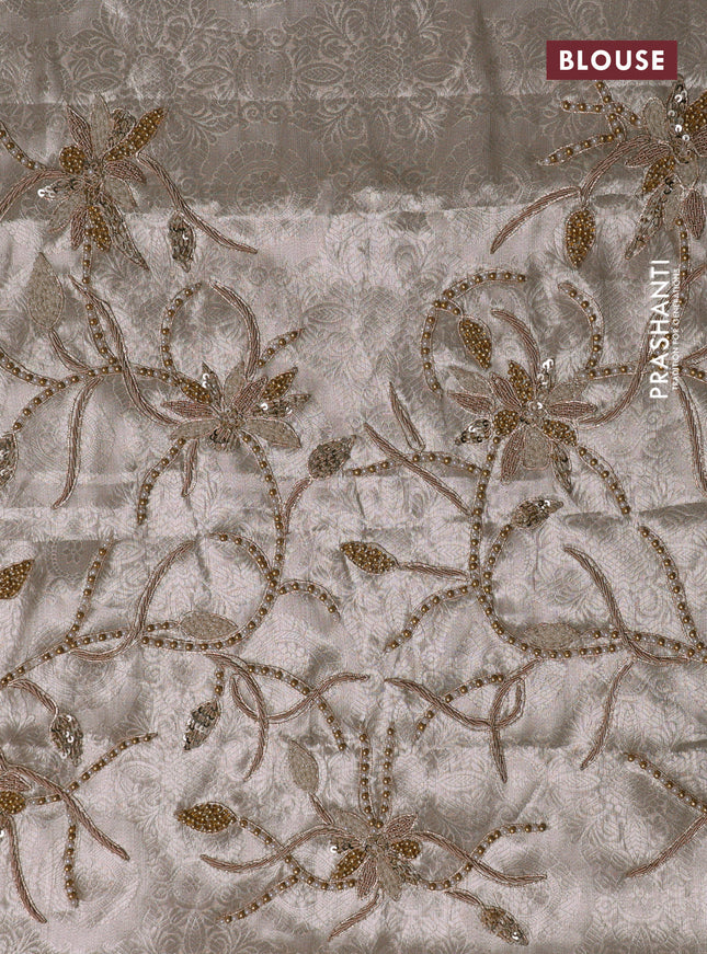 Tissue organza silk saree with allover stripes & embroidery