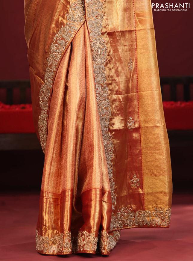 Gold & red Kanchipuram tissue Silk Saree with border Embroidery