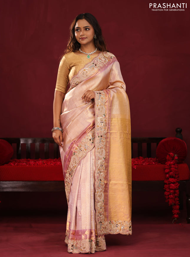 Golden tissue kanchipuram silk saree with allover zari weaves & border embroidery
