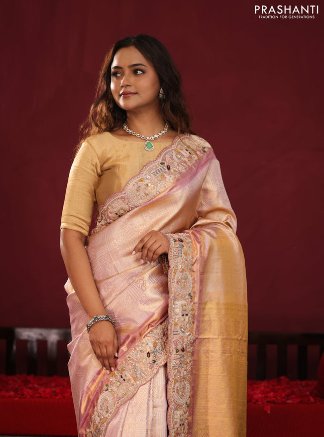 Golden tissue kanchipuram silk saree with allover zari weaves & border embroidery