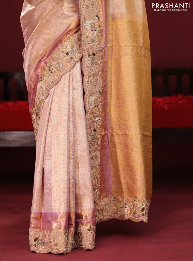Golden tissue kanchipuram silk saree with allover zari weaves & border embroidery