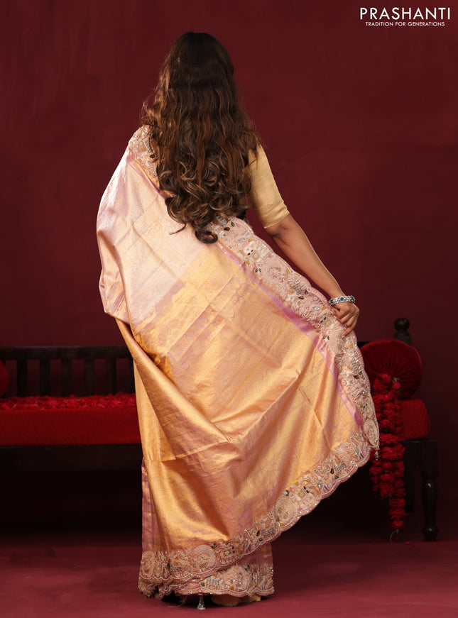 Golden tissue kanchipuram silk saree with allover zari weaves & border embroidery